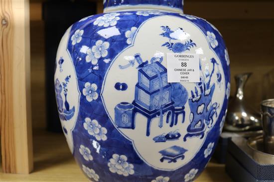 A 19th century Chinese blue and white jar and cover, height 29cm, damaged